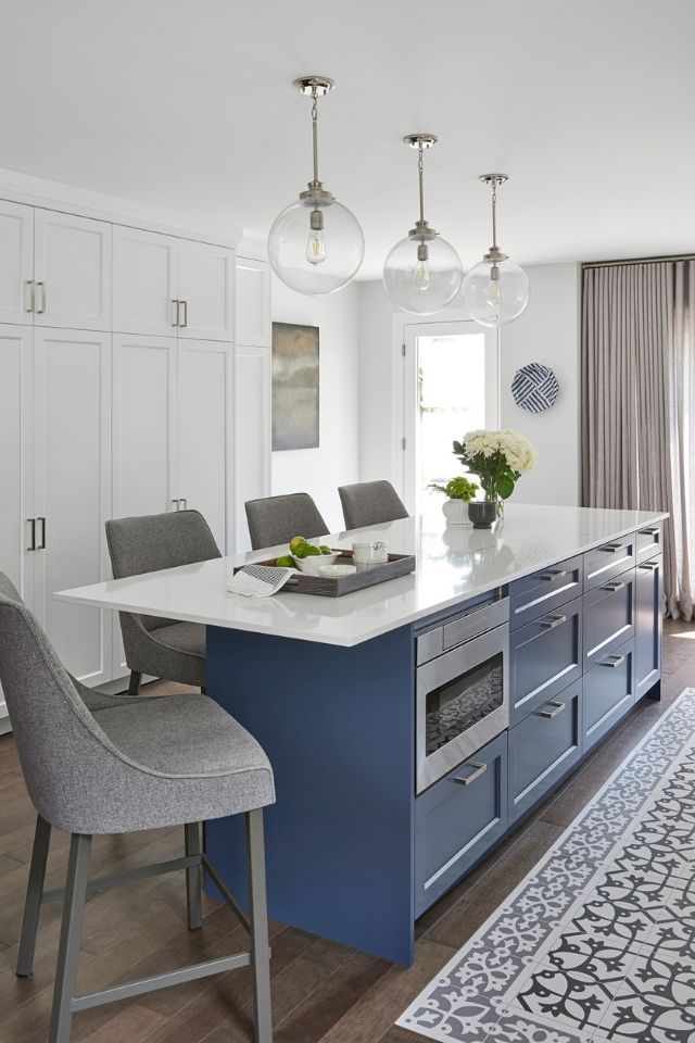 Kitchen with runner area rug between island and sink 